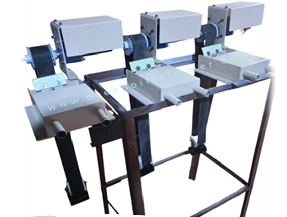 Oil skimmer for automotive manufacturing plant removing tramp oil from coolant tank